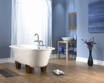 free standing bath in centre of traditional bathroom