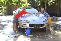 boys washing car