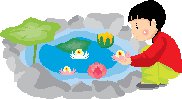 boy playing by pond