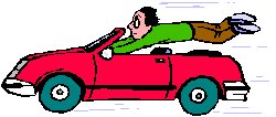 man hanging onto steering wheel of red sports car