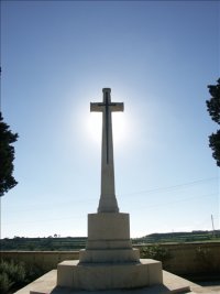 a cross in the light of the sun