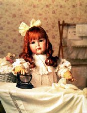 tableau of doll ironing