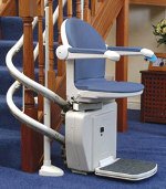 curved stairlift at foot of stairs