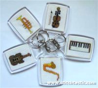 key rings with cross stitch inserts