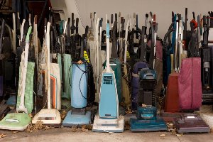 collection of old vacuum cleaners